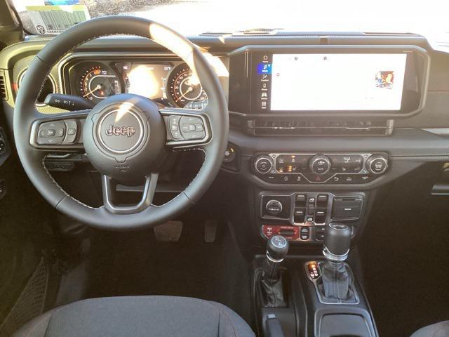 Photo of 2025 Granite Crystal Metallic Clearcoat Jeep Wrangler