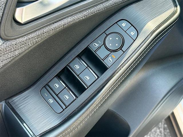 Photo of 2023 Pearl White Tricoat Nissan Rogue