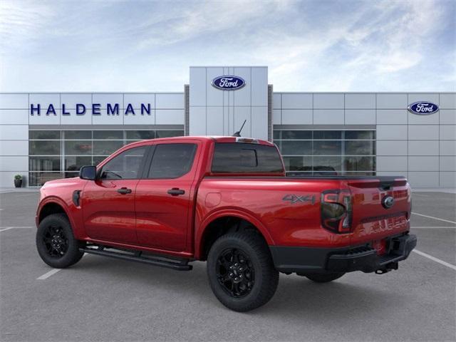 Photo of 2025 Ruby Red Metallic Tinted Clearcoat Ford Ranger