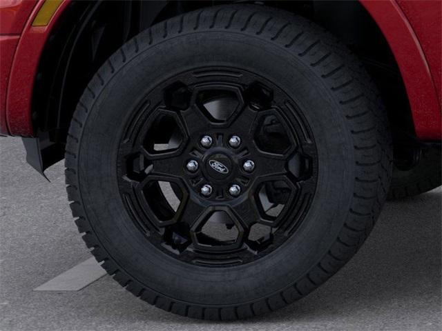 Photo of 2025 Ruby Red Metallic Tinted Clearcoat Ford Ranger
