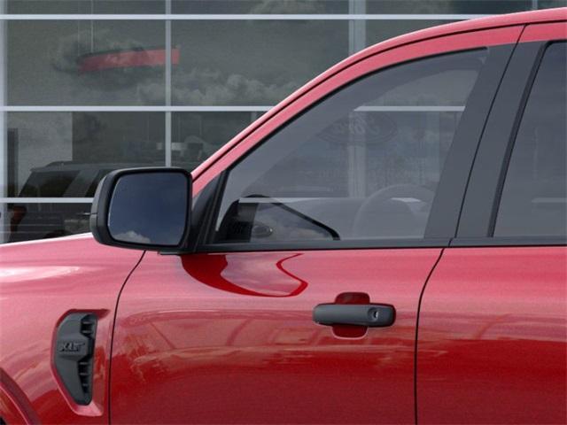 Photo of 2025 Ruby Red Metallic Tinted Clearcoat Ford Ranger