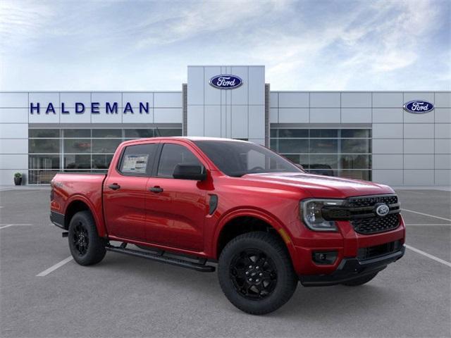 Photo of 2025 Ruby Red Metallic Tinted Clearcoat Ford Ranger