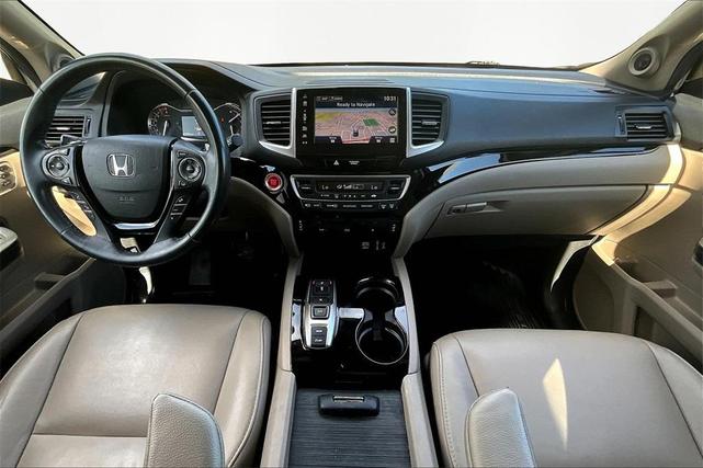 Photo of 2017 White Diamond Pearl Honda Pilot