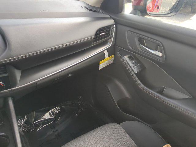 Photo of 2024 Scarlet Ember Tintcoat Nissan Rogue