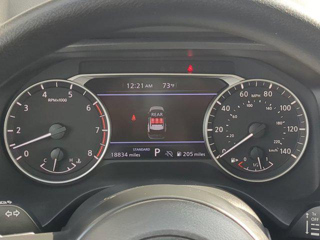 Photo of 2024 Scarlet Ember Tintcoat Nissan Rogue