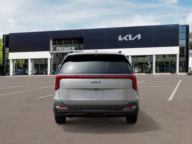 Photo of 2026 Ivory Silver Kia Carnival Hybrid