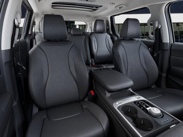 Photo of 2026 Ivory Silver Kia Carnival Hybrid
