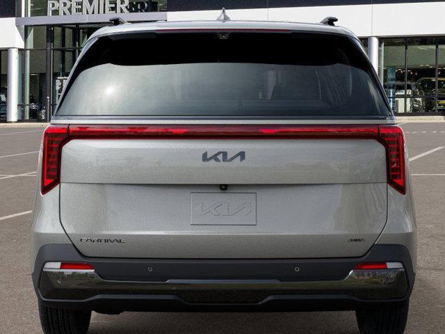 Photo of 2025 Ivory Silver Kia Carnival Hybrid