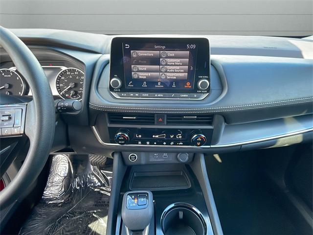 Photo of 2023 Scarlet Ember Tintcoat Nissan Rogue