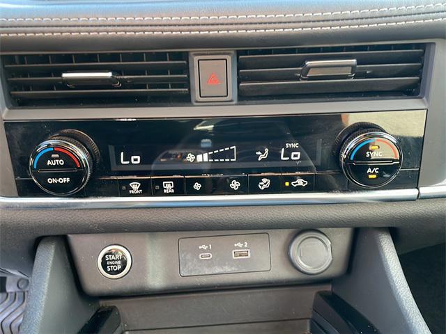 Photo of 2023 Scarlet Ember Tintcoat Nissan Rogue