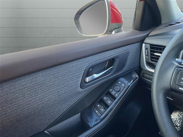 Photo of 2023 Scarlet Ember Tintcoat Nissan Rogue