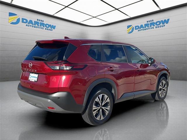 Photo of 2023 Scarlet Ember Tintcoat Nissan Rogue