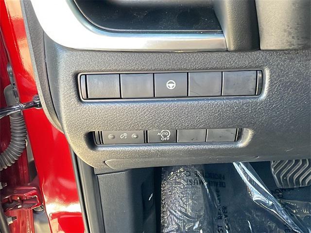 Photo of 2023 Scarlet Ember Tintcoat Nissan Rogue