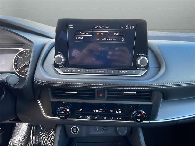 Photo of 2023 Scarlet Ember Tintcoat Nissan Rogue