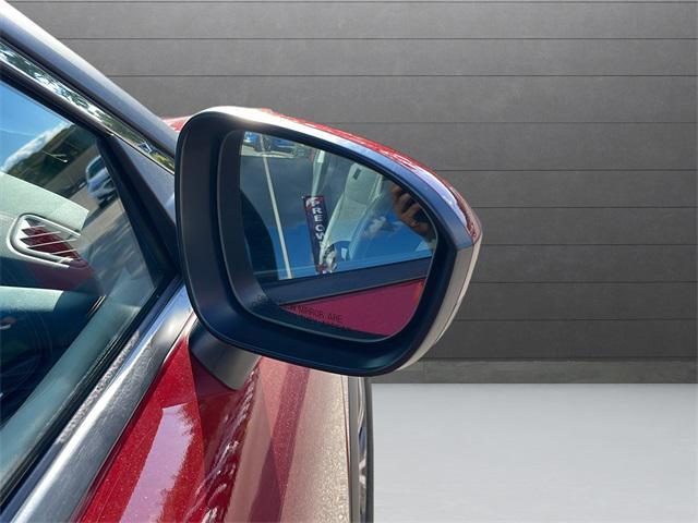 Photo of 2023 Scarlet Ember Tintcoat Nissan Rogue