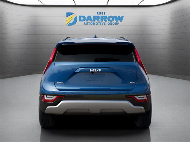 Photo of 2025 Mineral Blue Kia Niro