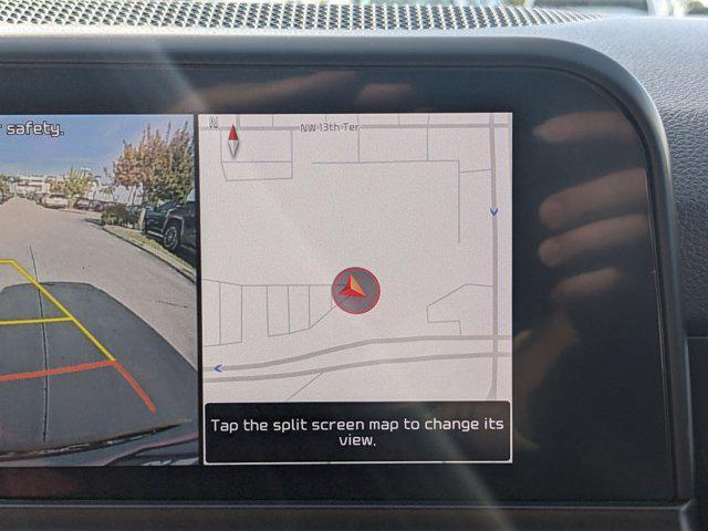 Photo of 2024 Pluton Blue/Black Roof Kia Seltos