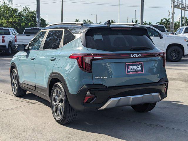 Photo of 2024 Pluton Blue/Black Roof Kia Seltos