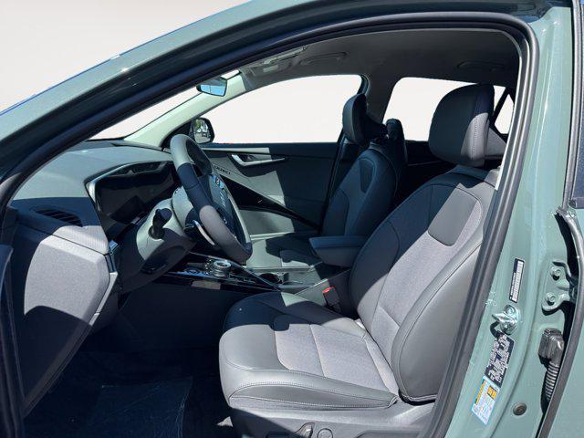 Photo of 2025 Cityscape Green Kia Niro EV