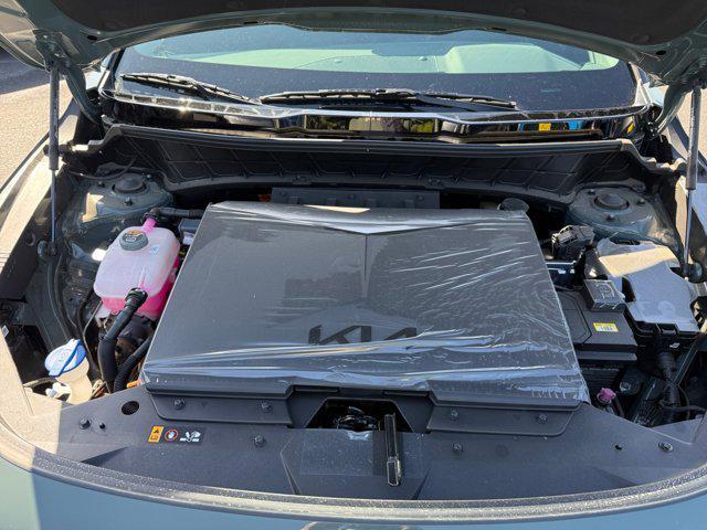 Photo of 2025 Cityscape Green Kia Niro EV