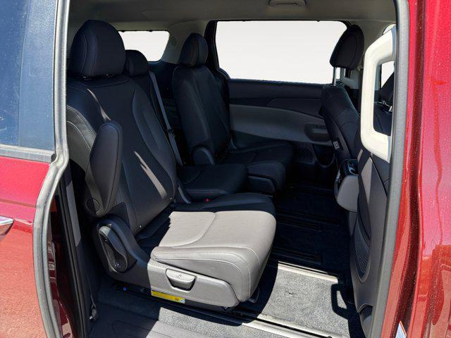 Photo of 2026 Flare Red Kia Carnival Hybrid