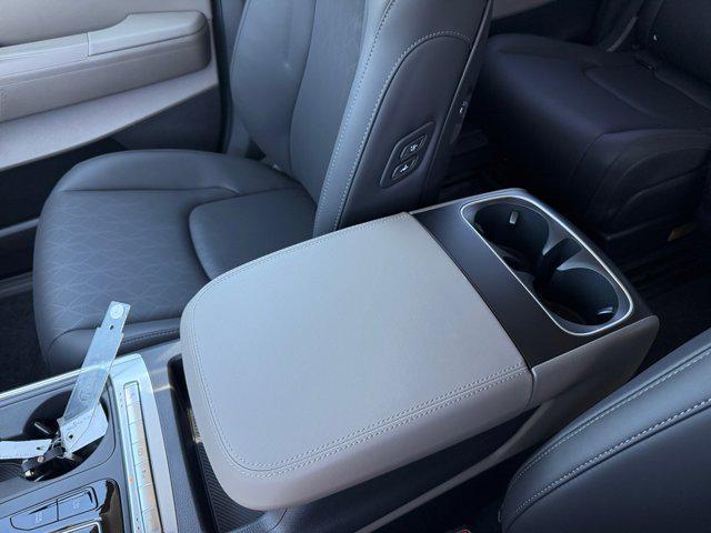 Photo of 2026 Flare Red Kia Carnival Hybrid