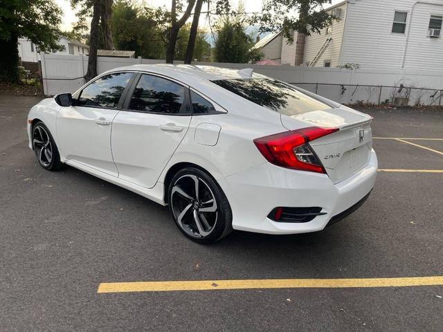 Photo of 2018 White Orchid Pearl Honda Civic