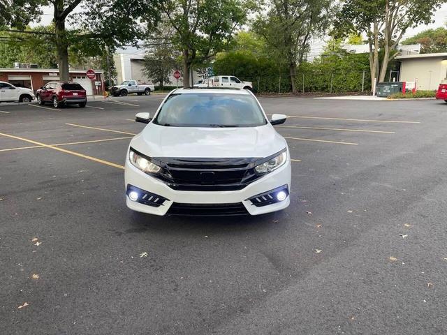 Photo of 2018 White Orchid Pearl Honda Civic