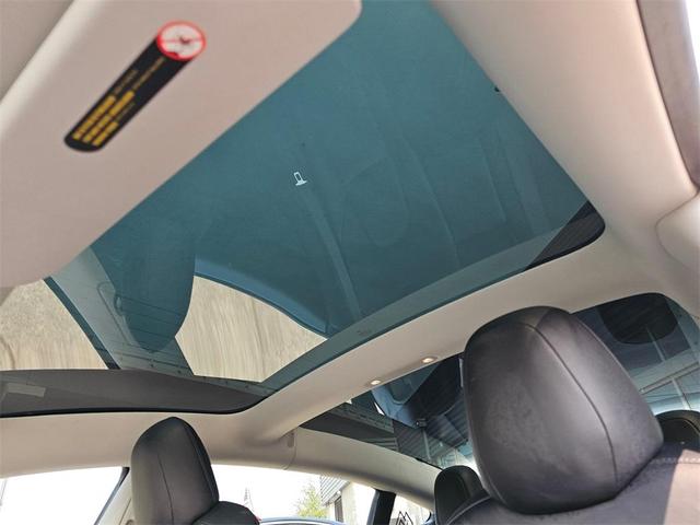 Photo of 2020 Pearl White Multi Tesla Model 3