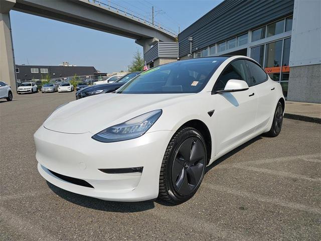 Photo of 2020 Pearl White Multi Tesla Model 3