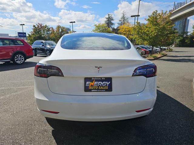 Photo of 2020 Pearl White Multi Tesla Model 3
