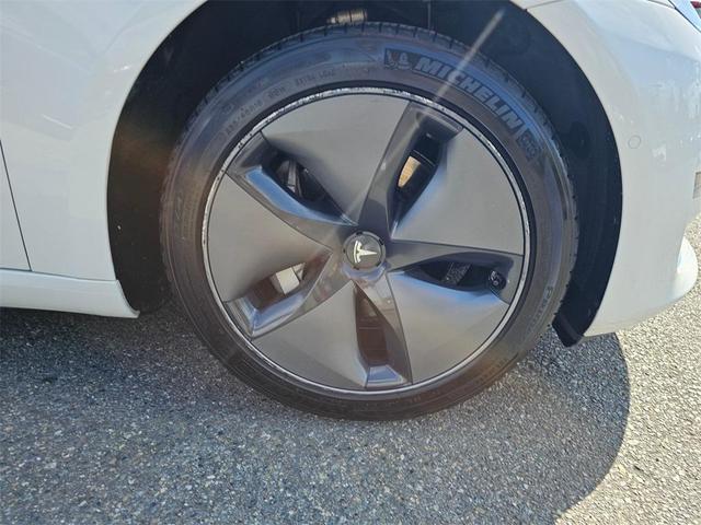 Photo of 2020 Pearl White Multi Tesla Model 3