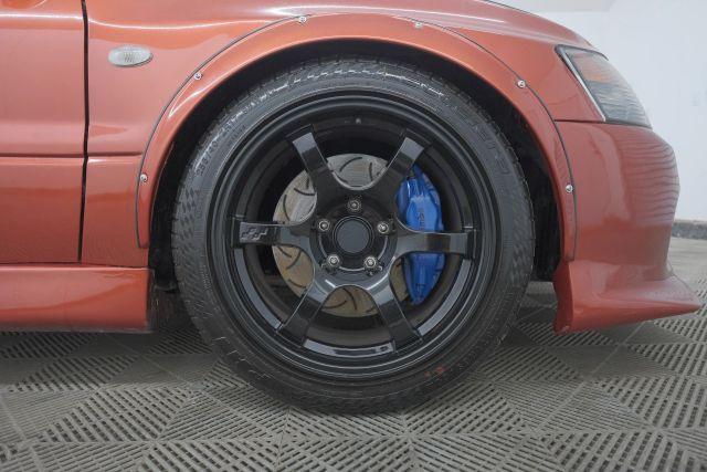 Photo of 2006 Rotor Glow Metallic Mitsubishi Lancer Evolution