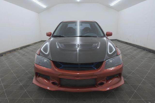 Photo of 2006 Rotor Glow Metallic Mitsubishi Lancer Evolution