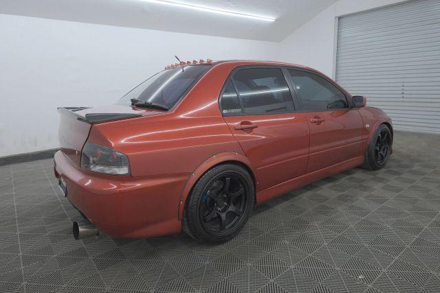 Photo of 2006 Rotor Glow Metallic Mitsubishi Lancer Evolution