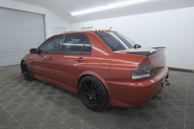 Photo of 2006 Rotor Glow Metallic Mitsubishi Lancer Evolution