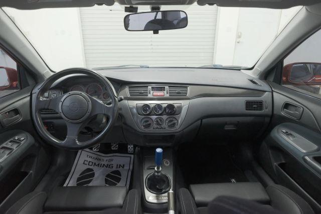 Photo of 2006 Rotor Glow Metallic Mitsubishi Lancer Evolution