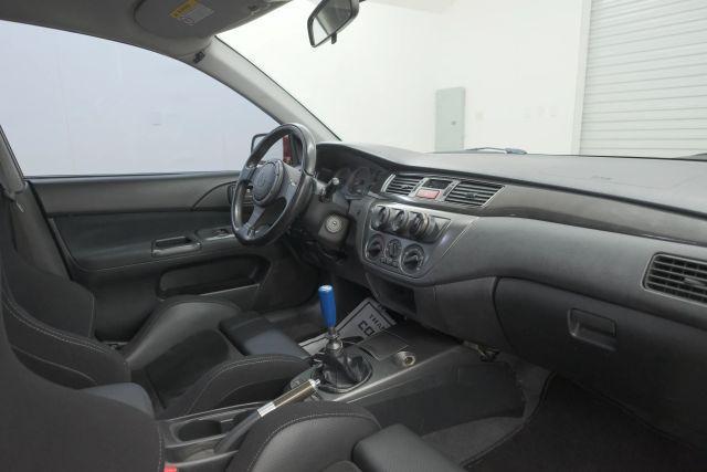 Photo of 2006 Rotor Glow Metallic Mitsubishi Lancer Evolution