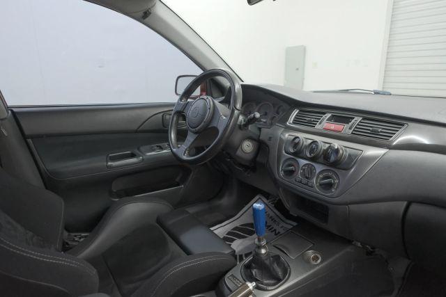 Photo of 2006 Rotor Glow Metallic Mitsubishi Lancer Evolution