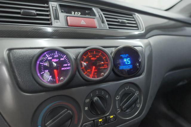 Photo of 2006 Rotor Glow Metallic Mitsubishi Lancer Evolution