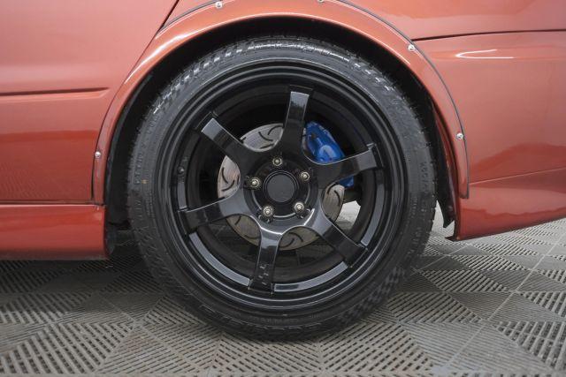 Photo of 2006 Rotor Glow Metallic Mitsubishi Lancer Evolution