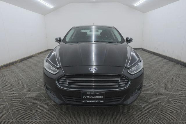 Photo of 2015 Tuxedo Black Metallic Ford Fusion