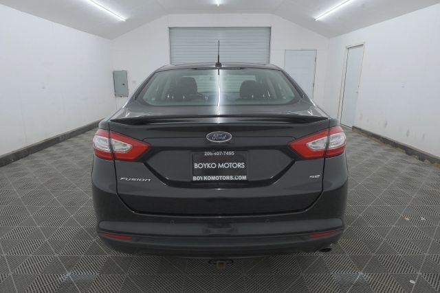 Photo of 2015 Tuxedo Black Metallic Ford Fusion