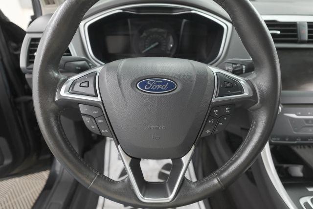 Photo of 2015 Tuxedo Black Metallic Ford Fusion
