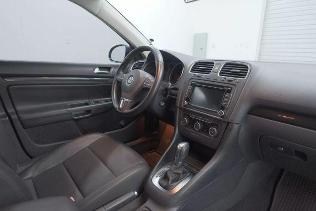 Photo of 2013 Tempest Blue Metallic Volkswagen Jetta SportWagen