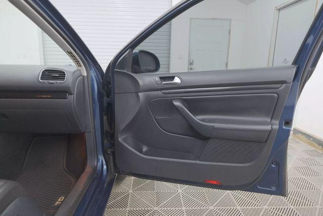 Photo of 2013 Tempest Blue Metallic Volkswagen Jetta SportWagen