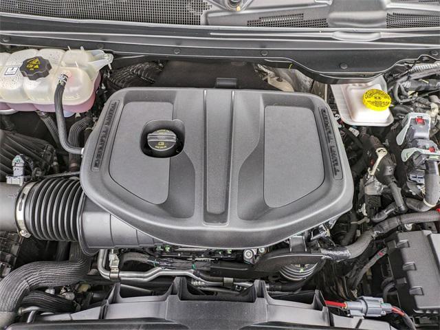 Photo of 2025 Diamond Black Crystal Pearlcoat RAM 1500