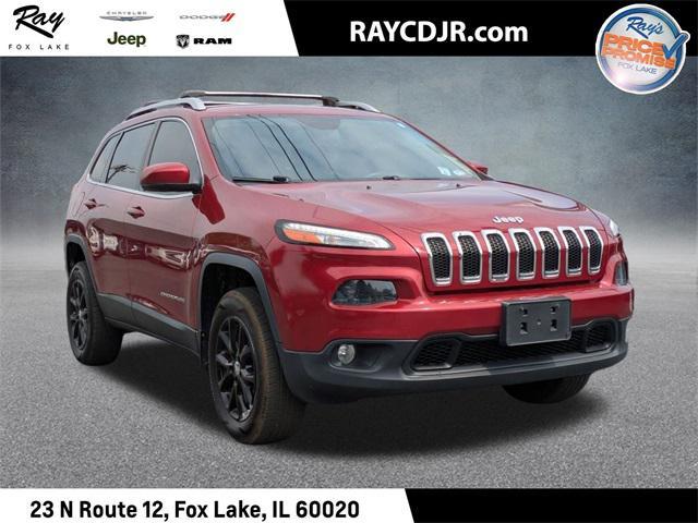 Photo of 2016 Deep Cherry Red Crystal Pearlcoat Jeep Cherokee