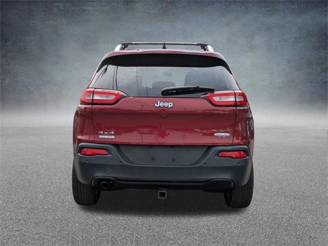 Photo of 2016 Deep Cherry Red Crystal Pearlcoat Jeep Cherokee