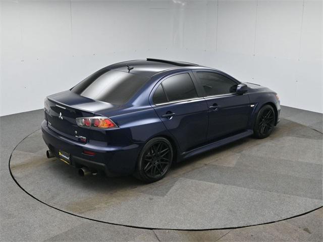 Photo of 2013 Cosmic Blue Pearl Mitsubishi Lancer Evolution